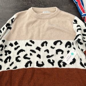 Brand new, animal print sweater with tags
